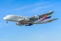 Airplane Emirates A6-EOO Airbus A380-800 is landing at Schiphol airport.