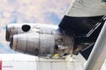 Airplane engine with blue sky .under aircraft wing view Royalty Free Stock Photo