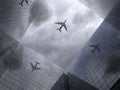 Airplane flies over the tops of skyscrapers