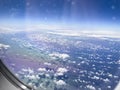Airplane flight. Wing of an airplane flying above the clouds and sea in La Palma, Canary Islands. View from the window of the Royalty Free Stock Photo