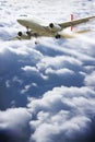 Airplane flying above the clouds - concept image with copy space Royalty Free Stock Photo