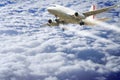 Airplane flying above the clouds - concept image with copy space Royalty Free Stock Photo