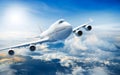 Airplane flying above clouds Royalty Free Stock Photo