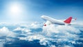 Airplane flying above clouds Royalty Free Stock Photo