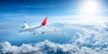 Airplane flying above clouds Royalty Free Stock Photo