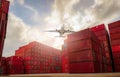 Airplane flying above container logistic. Container crisis. Freight transportation. Logistic industry. Container ship for export