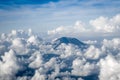 Airplane flying above Mount Agung volcano, Bali, Indonesia Royalty Free Stock Photo