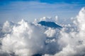 Airplane flying above Mount Agung volcano, Bali, Indonesia Royalty Free Stock Photo