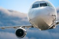 Airplane is flying above sky. Clouds in background. Royalty Free Stock Photo