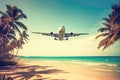 Airplane flying above tropical sea beach Royalty Free Stock Photo