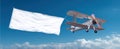 The airplane flying with a blank white banner in a clear blue sky. AI generated image Royalty Free Stock Photo