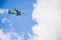 Airplane flying blue sky Royalty Free Stock Photo