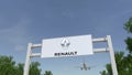 Airplane flying over advertising billboard with Groupe Renault logo. Editorial 3D rendering