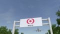 Airplane flying over advertising billboard with MUFG logo. Editorial 3D rendering 4K clip