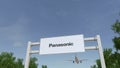 Airplane flying over advertising billboard with Panasonic Corporation logo. Editorial 3D rendering 4K clip