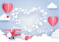 Airplane flying over clouds and smoke hearts shape background Royalty Free Stock Photo