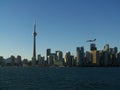 Airplane flying over Downtown Toronto Ontario Canada skyline view from Lake Ontario Royalty Free Stock Photo