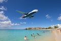 Airplane flying over Maho Beach, Sint Maarten, Dutch Caribbean