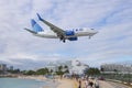 Airplane flying over Maho Beach, Sint Maarten, Dutch Caribbean