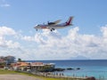 Airplane flying over Maho Beach, Sint Maarten, Dutch Caribbean