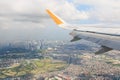 Airplane flying over Manila, Philippines Royalty Free Stock Photo