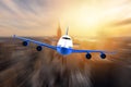 Airplane flying over a moden metropoly Royalty Free Stock Photo