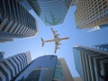 Airplane flying over skyscrapers n city downtown district. Business corporate travel background concept. 3 Royalty Free Stock Photo