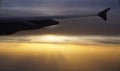 Airplane flying, sunset. Royalty Free Stock Photo