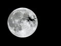 Airplane flying to the moon Royalty Free Stock Photo