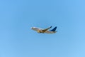 Airplane flying under the sky Royalty Free Stock Photo