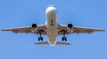 Airplane flying under the sky. Royalty Free Stock Photo