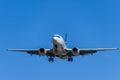 Airplane flying under the sky. Royalty Free Stock Photo