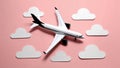 Airplane flying among white clouds on a pink background setting Royalty Free Stock Photo