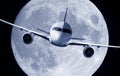 Airplane and a full moon Royalty Free Stock Photo