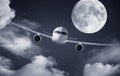 Airplane and a full moon Royalty Free Stock Photo