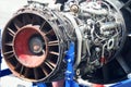Airplane gas turbine engine detail in aviation hangar. Royalty Free Stock Photo