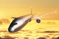 Airplane in golden sky Royalty Free Stock Photo