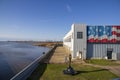 The airplane hangar at USS Alabama Battleship Memorial Park with an American flag painted on the top of the building