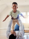 Airplane, happy and portrait of child with father in the living room of modern house having fun. Smile, love and young