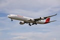 A airplane of Iberia airlines flying in the sky