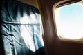 Airplane interior passenger seat and window