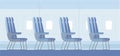 Airplane interior with seats. Windows from inside the airplane. Airplane interior design. Airplane chairs Royalty Free Stock Photo