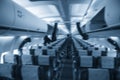 Airplane interior voluntarily blurred