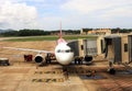 Airplane on land boarding for departure Royalty Free Stock Photo