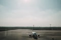 Airplane landed on a runway on a bright day - concept of fast travel