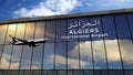 Airplane landing at Algiers Algeria airport mirrored in terminal