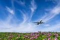 airplane landing with blue sky background at Phuket airport, Thailand Royalty Free Stock Photo