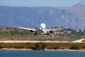 Airplane landing on Corfu airport Royalty Free Stock Photo