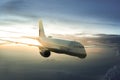 Airplane Landing over the clouds Royalty Free Stock Photo