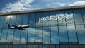 Airplane landing at Jackson USA airport mirrored in terminal